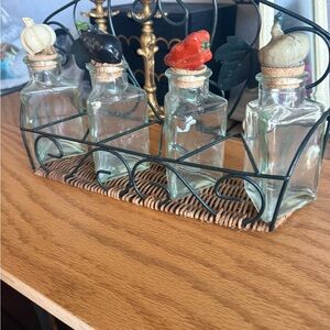 Vintage metal and wicker spice bottles